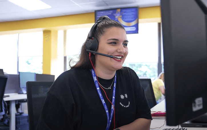 Call centre agent in front of a computer screen